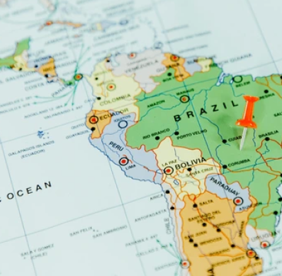 Map of South America with a red pin on Brazil